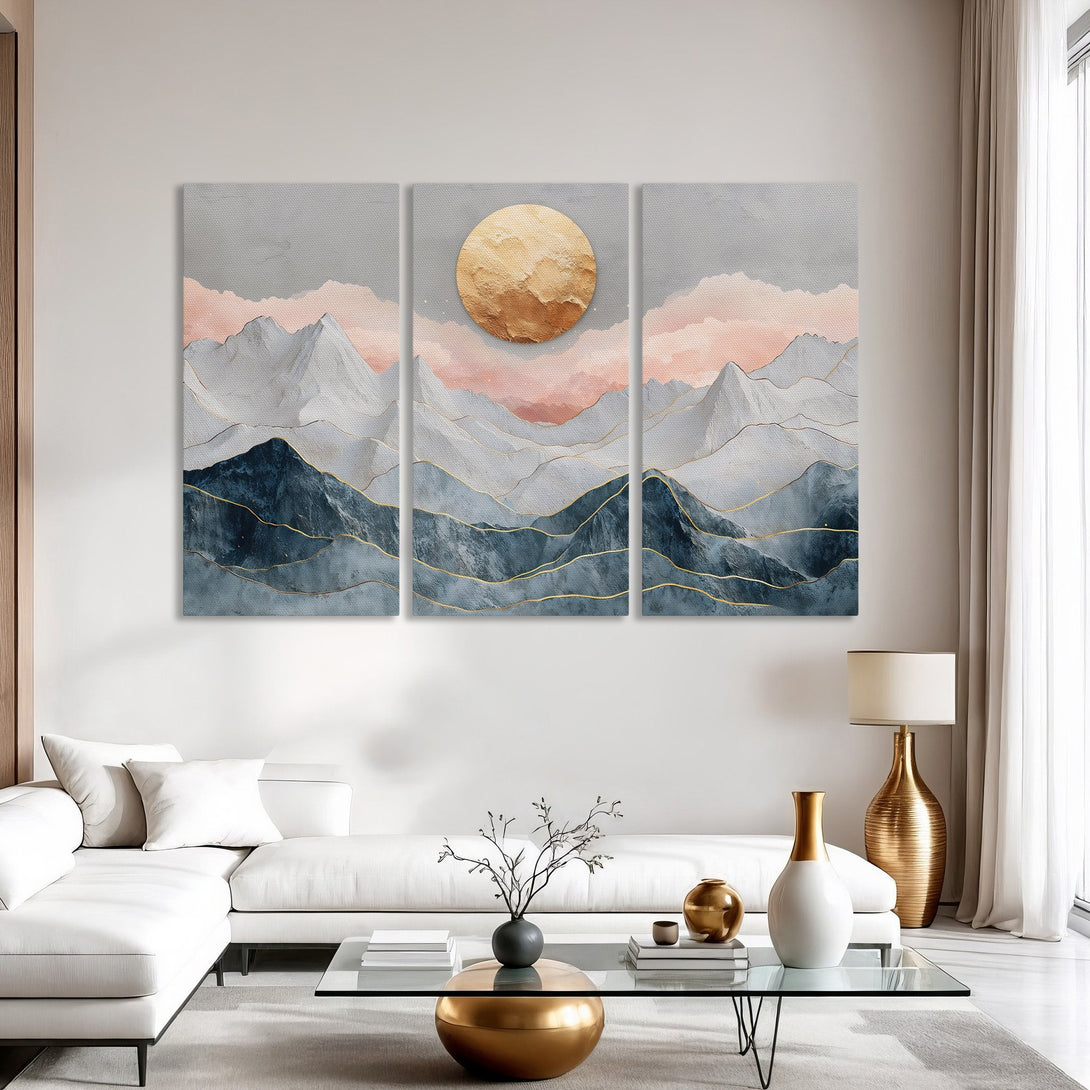 Abstract mountain Canvas Print in a modern interior. Features a gold sun, blue, gray, and pink color palette. Perfect wall art for your home!