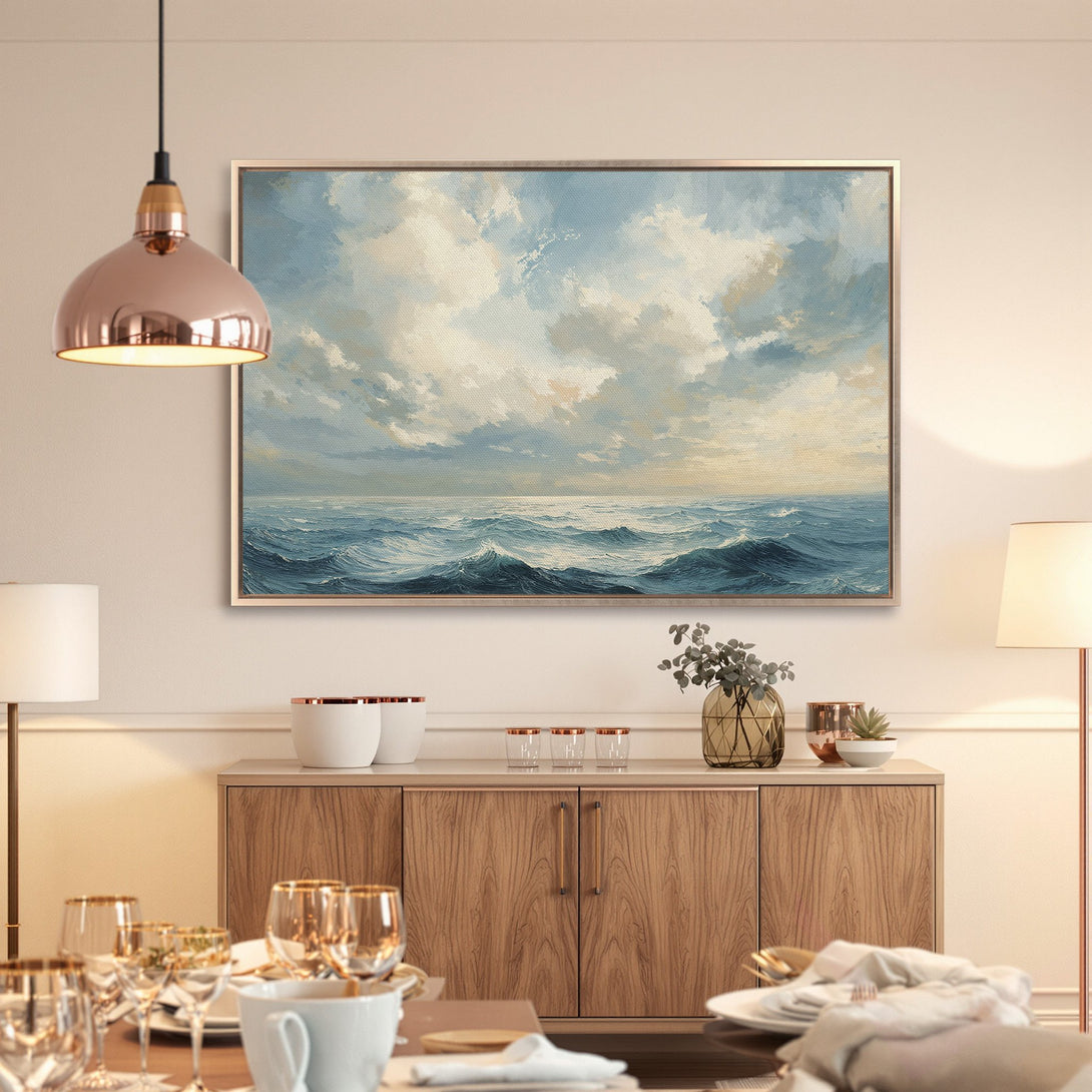 Framed Wall Art: Ocean waves canvas print with a serene blue and neutral color palette. Perfect for coastal decor and adding a touch of elegance.