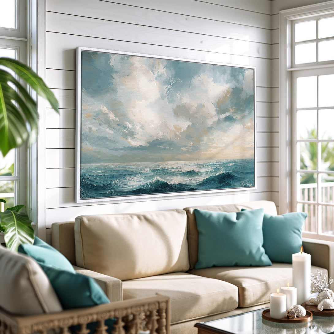 Framed Wall Art: Ocean waves painting in a coastal living room. Blue, white, and beige color palette. Perfect for beach house decor.