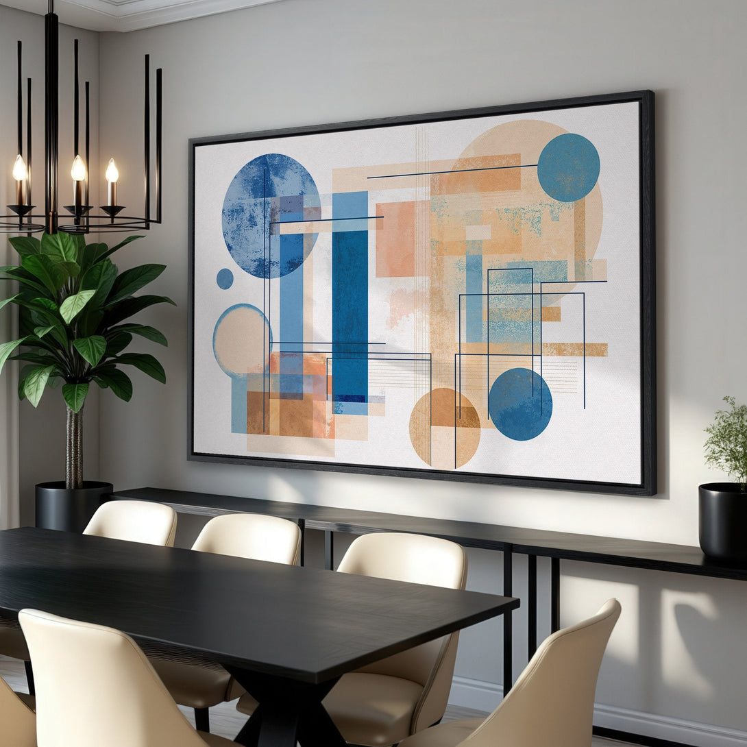 Framed Wall Art featuring an abstract geometric design in blue, beige, and orange, displayed in a modern dining room setting.