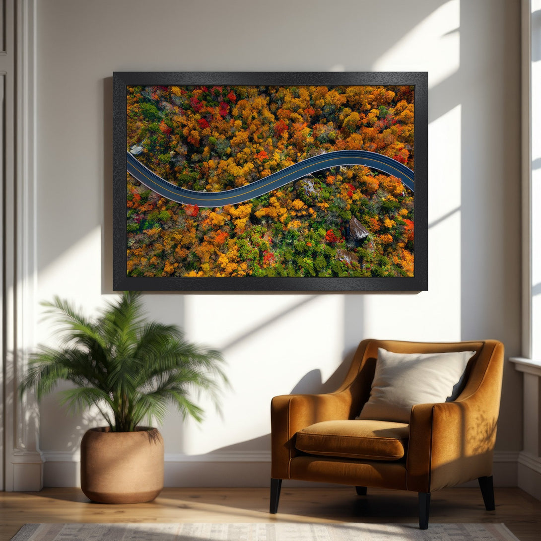 Framed Poster of winding road through vibrant autumn forest. Warm, inviting color palette. Perfect wall art!