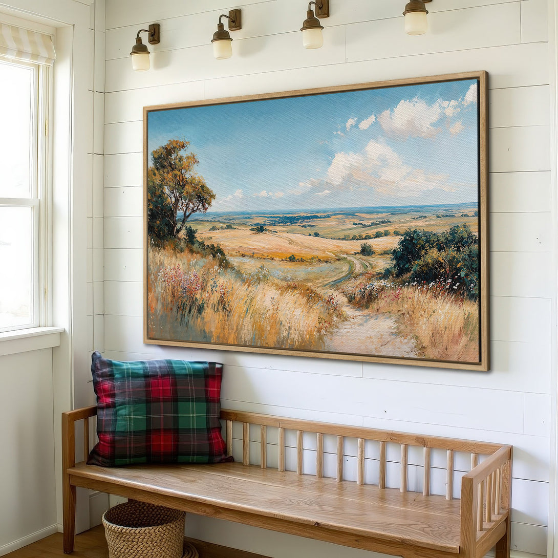 Framed Wall Art of a serene landscape painting in warm earth tones and blue sky. Perfect for adding a touch of nature to your home decor.