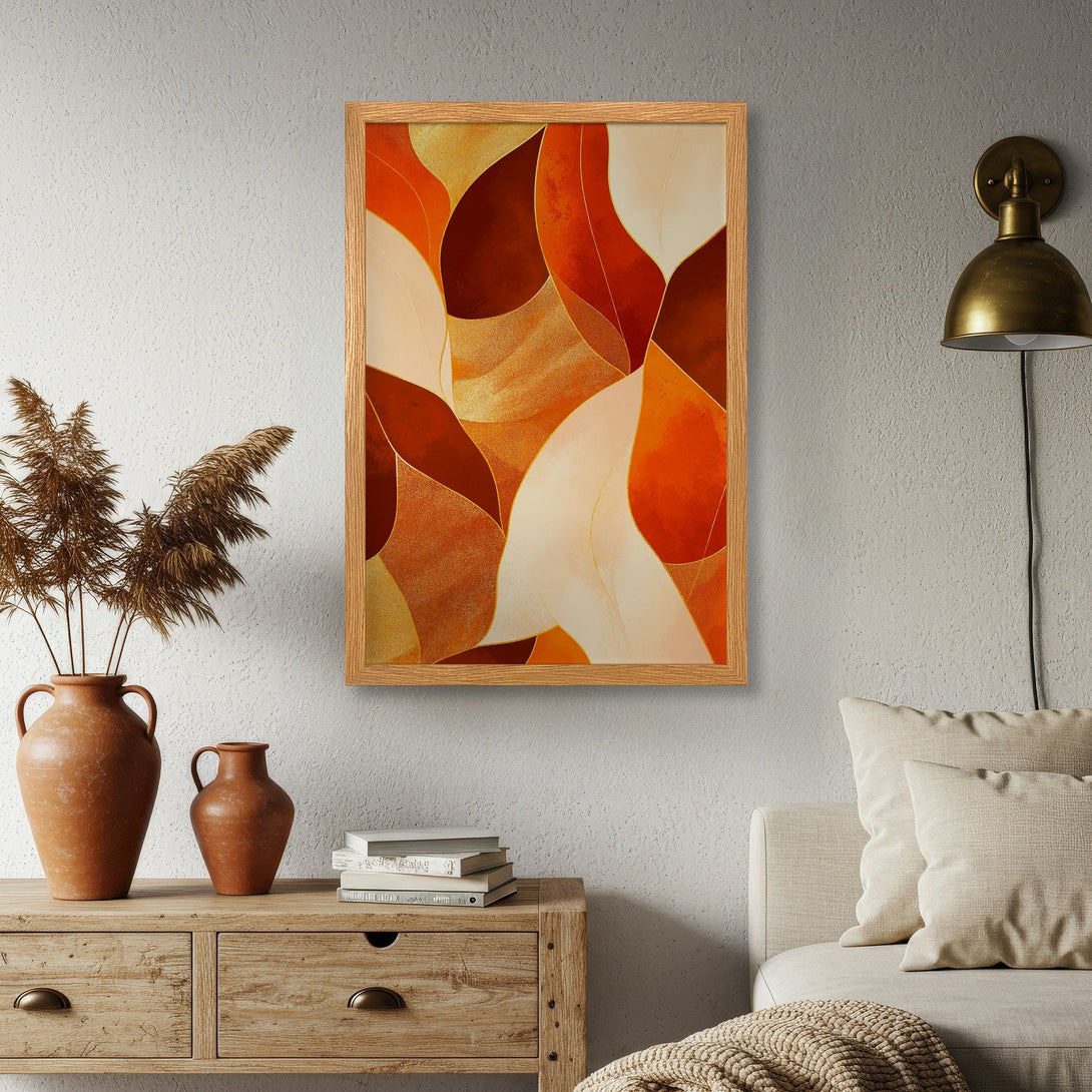 Framed Poster featuring abstract leaf design in warm orange and gold tones. Modern art for your home decor.