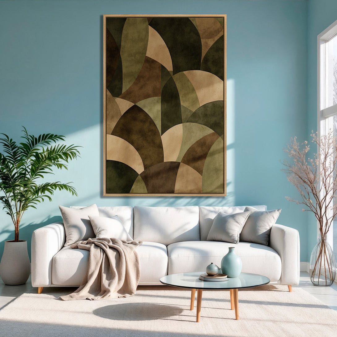 Framed Wall Art featuring abstract geometric design in earthy green and brown tones, displayed in a modern living room with a blue wall.