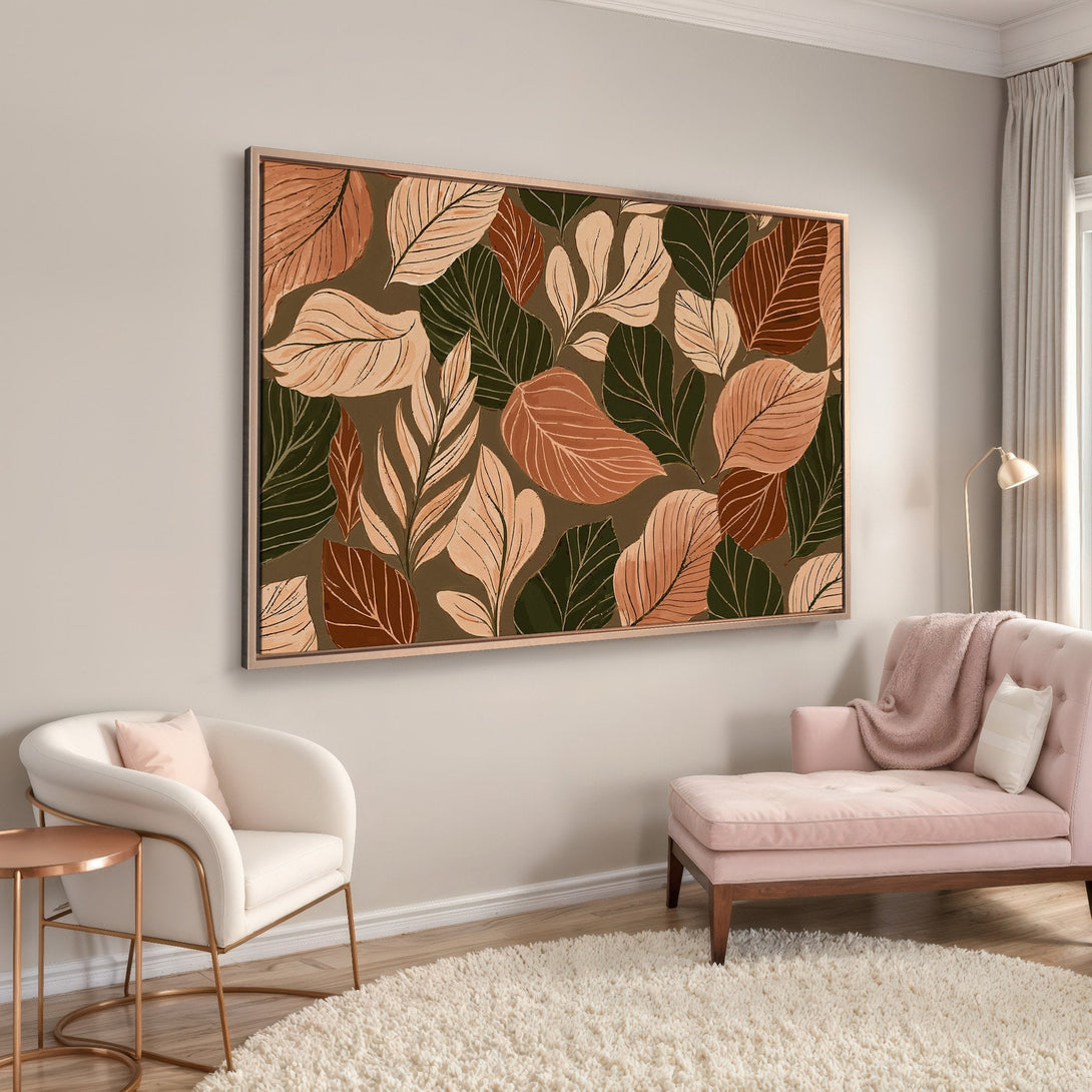 Framed Wall Art featuring a botanical leaf design in warm earthy tones. Modern art for a stylish living room.