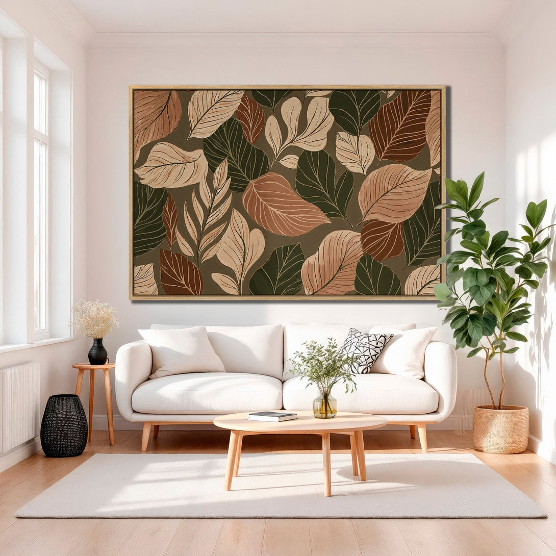 Framed Wall Art featuring a botanical leaf design in a warm, earthy color palette. Modern decor for a stylish living room.