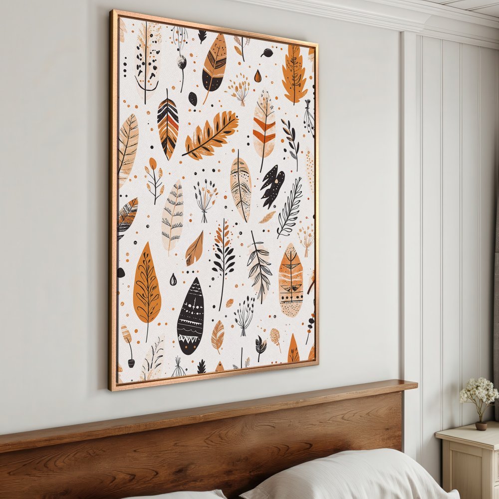Framed Wall Art featuring a boho feather pattern in warm orange, black, and cream tones. Perfect for adding a touch of nature-inspired style to your space.