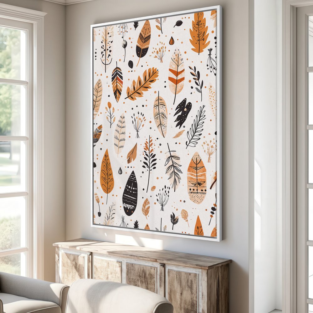 Framed Wall Art featuring a boho feather pattern in warm orange, black, and cream. Perfect for adding a touch of nature-inspired style to your home.