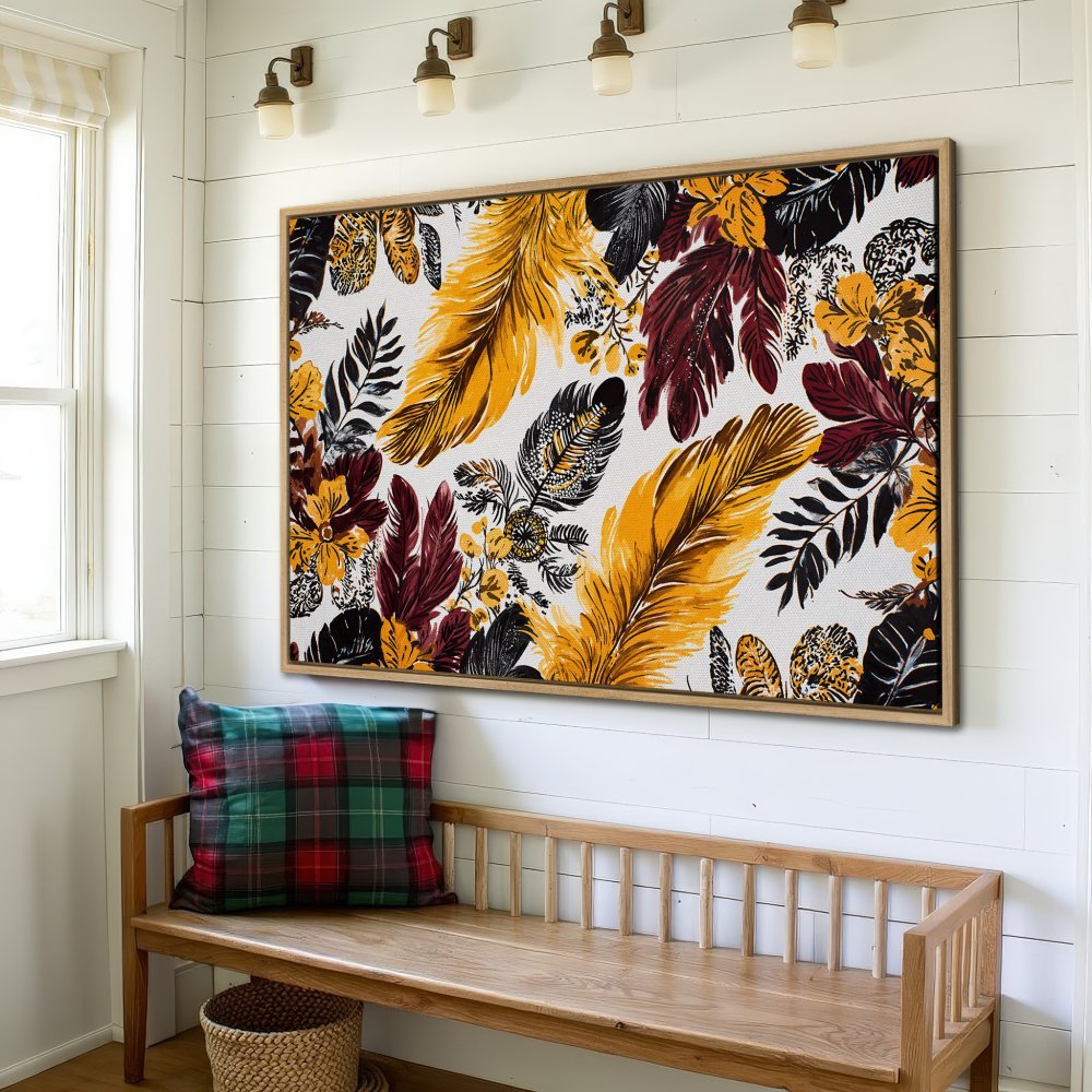 Framed Wall Art featuring a vibrant feather design in yellow, burgundy, and black. Adds a touch of boho style to any interior.