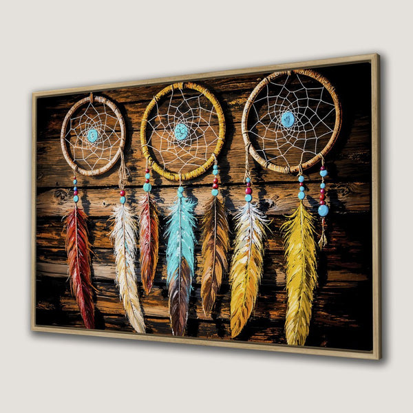 Framed Wall Art: Dreamcatcher canvas print with rustic wood background, featuring vibrant feathers in warm and cool tones. Perfect boho decor!