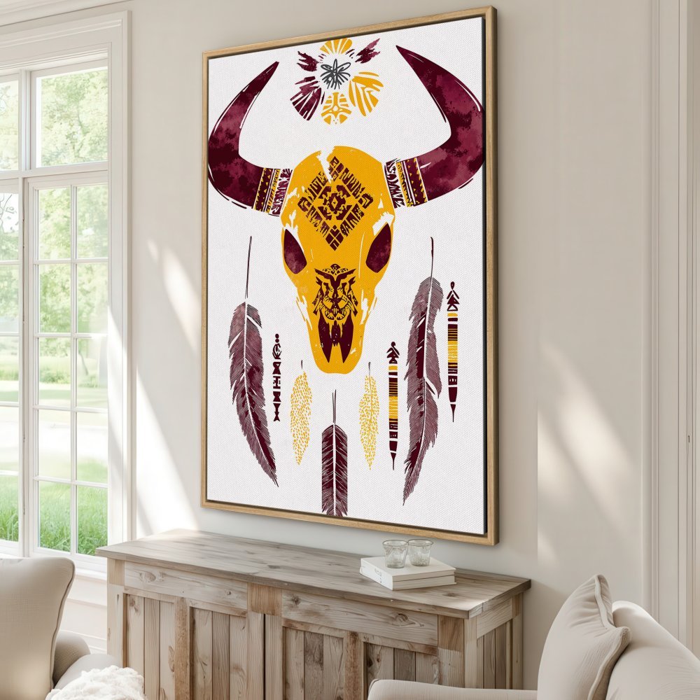 Framed Wall Art: Boho-style canvas print with a bull skull and feather design in warm yellow, burgundy, and white. Perfect for your home!