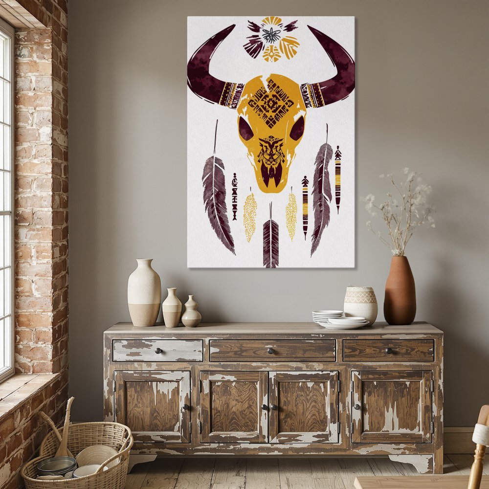Framed Wall Art: Boho-chic canvas print featuring a bull skull in yellow and burgundy. Perfect for adding a touch of Southwestern style to your home!
