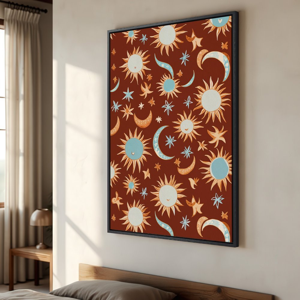 Framed Wall Art featuring a whimsical sun and moon pattern in a warm terracotta color palette. Add bohemian style to your space!