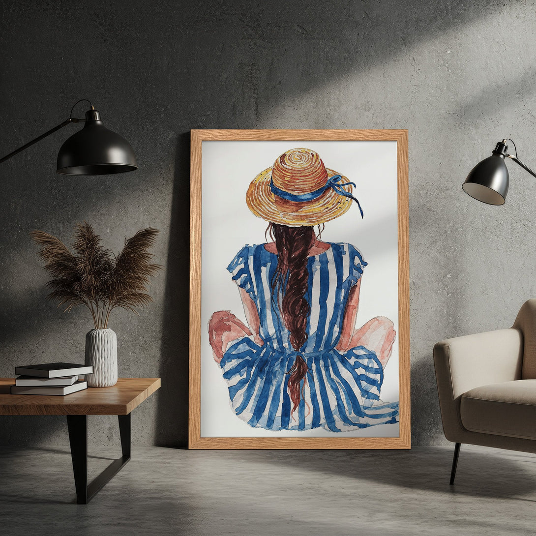 Framed Poster featuring a watercolor illustration of a woman in a hat and blue dress. Soft, artistic style with a blue, brown, and white color palette.
