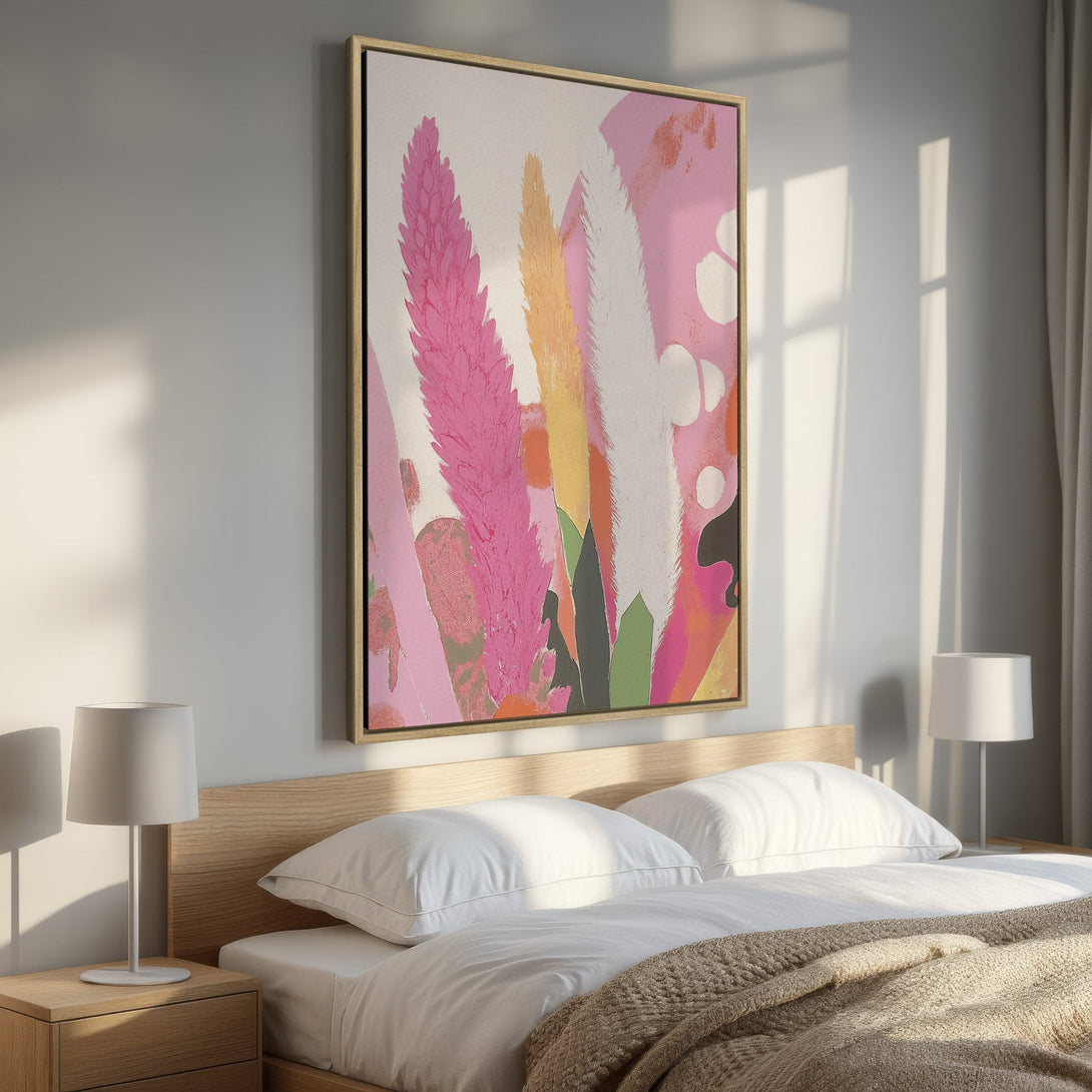 Framed Wall Art featuring abstract floral art in pink, yellow, and white. Modern style canvas print adds a pop of color to any bedroom.