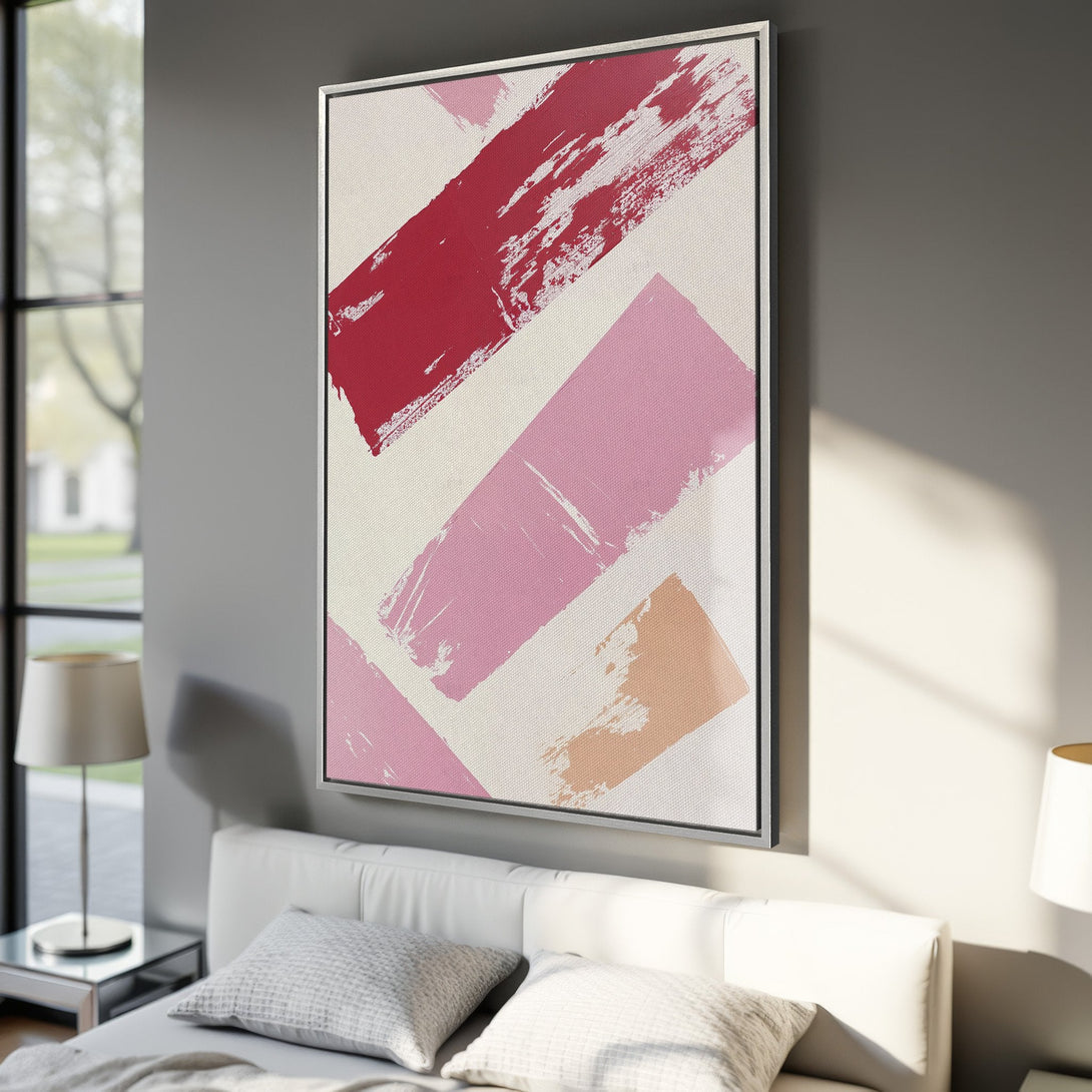 Framed Wall Art: Abstract brushstroke art in red, pink, and peach hues. Modern canvas print adds a pop of color to any bedroom or living space.
