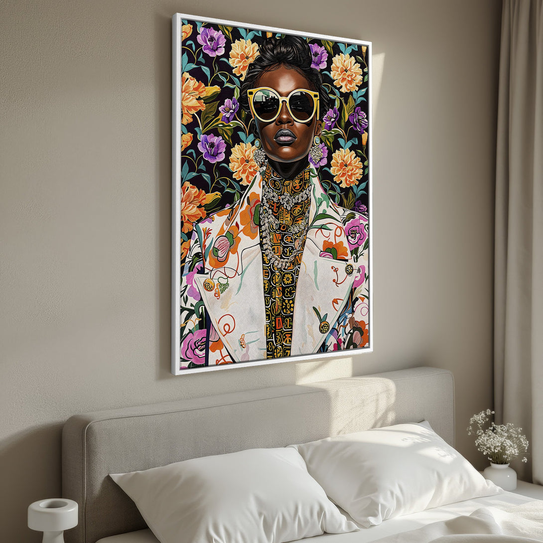 Framed Wall Art featuring a stylish woman with floral background. Vibrant colors and bold design perfect for adding a pop of art to your bedroom.