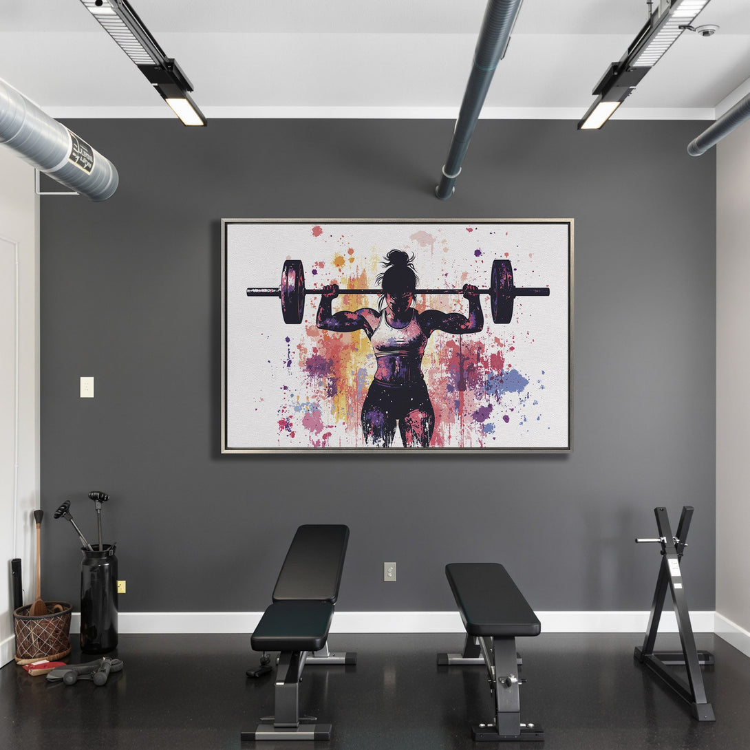 Framed Wall Art: Abstract watercolor canvas print of a weightlifter in a gym. Vibrant colors pop against a neutral background, perfect for home decor.