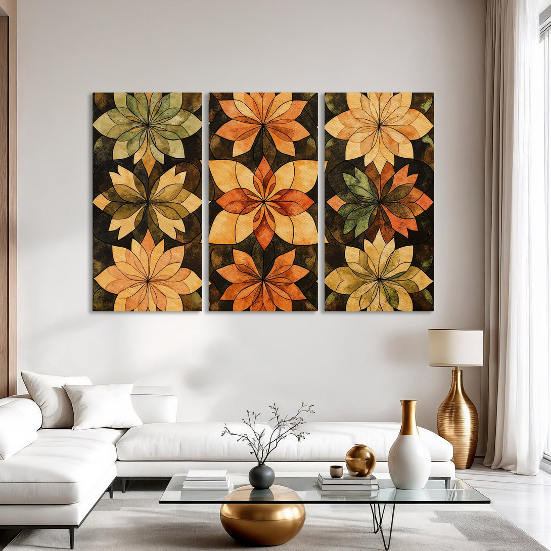 Canvas Print triptych featuring abstract floral art in warm orange, yellow, and green hues. Perfect for modern living room decor.