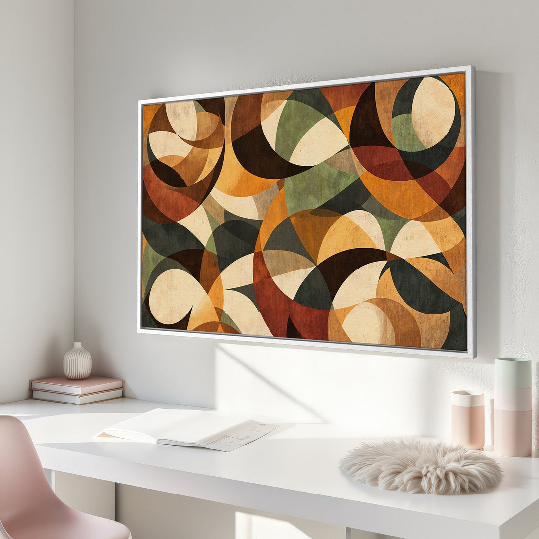 Framed Wall Art featuring an abstract geometric design in warm earth tones. Perfect for adding a touch of modern art to your home decor.