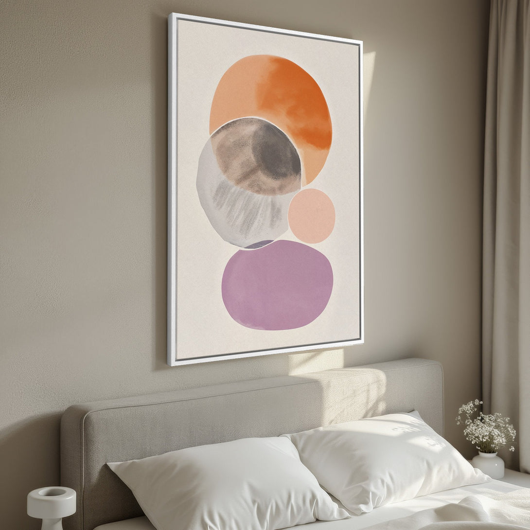 Framed Wall Art featuring abstract geometric shapes in warm orange, purple, and neutral tones. Modern art canvas print for bedroom or living room decor.