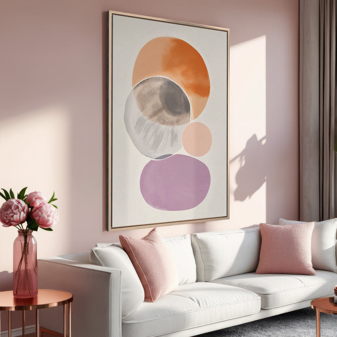Framed Wall Art featuring an abstract watercolor design in soft orange, purple, and gray tones. Modern art for your living room.