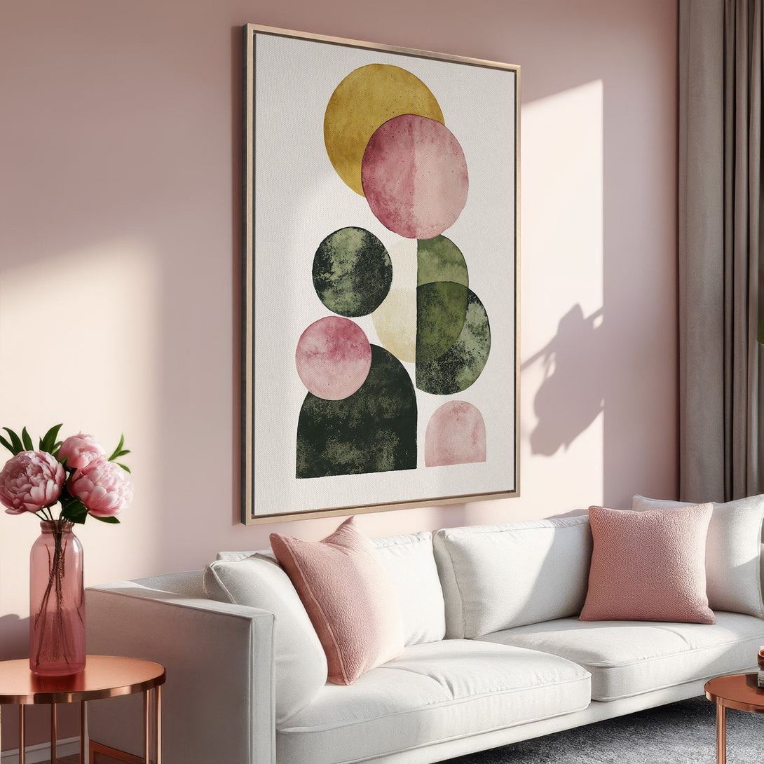 Framed Wall Art featuring abstract geometric circles in a blush, olive, and gold color palette. Modern art for your living room.