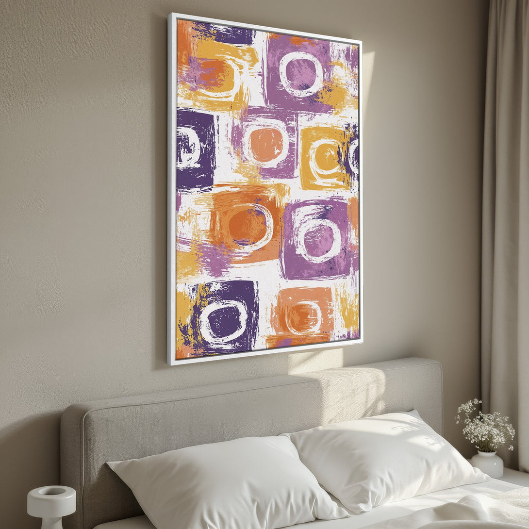 Framed Wall Art: Abstract brushstroke design in purple, orange, and yellow. Modern canvas print adds a pop of color to any bedroom or living space.
