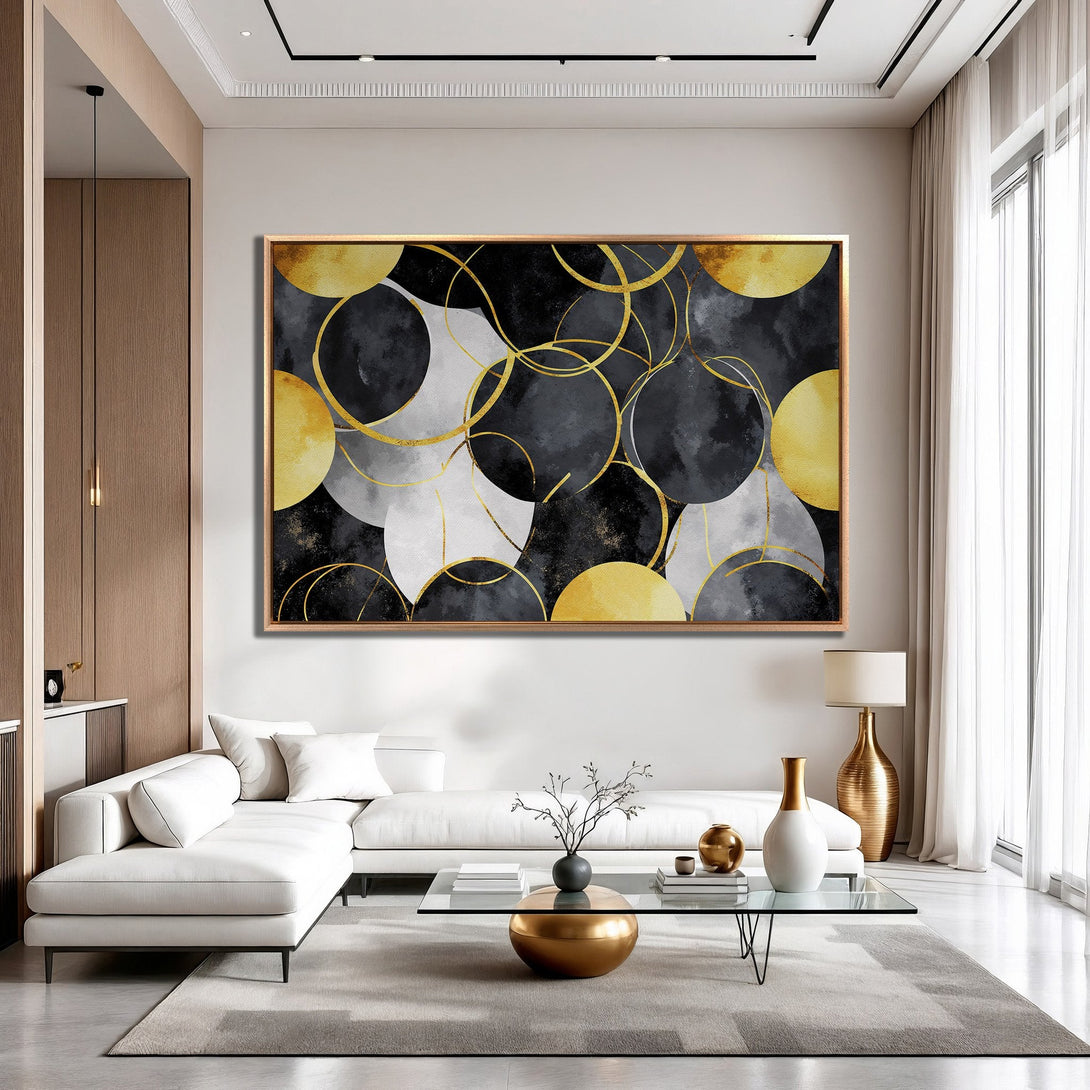 Framed Wall Art: Abstract gold, black, and gray circles canvas print. Modern art for living room decor. Adds a touch of luxury.