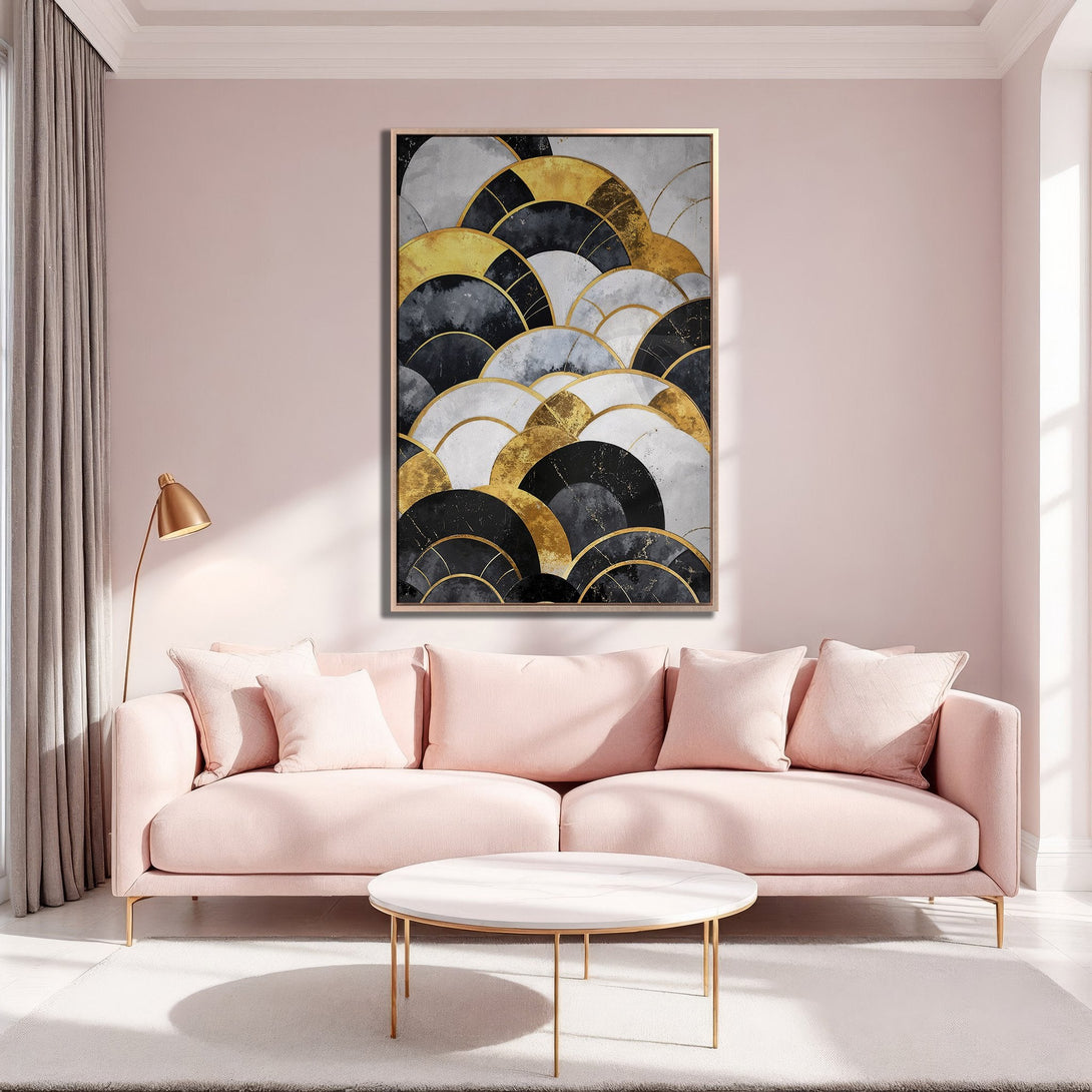 Framed Wall Art featuring an abstract geometric design in gold, black, and white. Modern art decorates a blush pink living room, enhancing interior design.