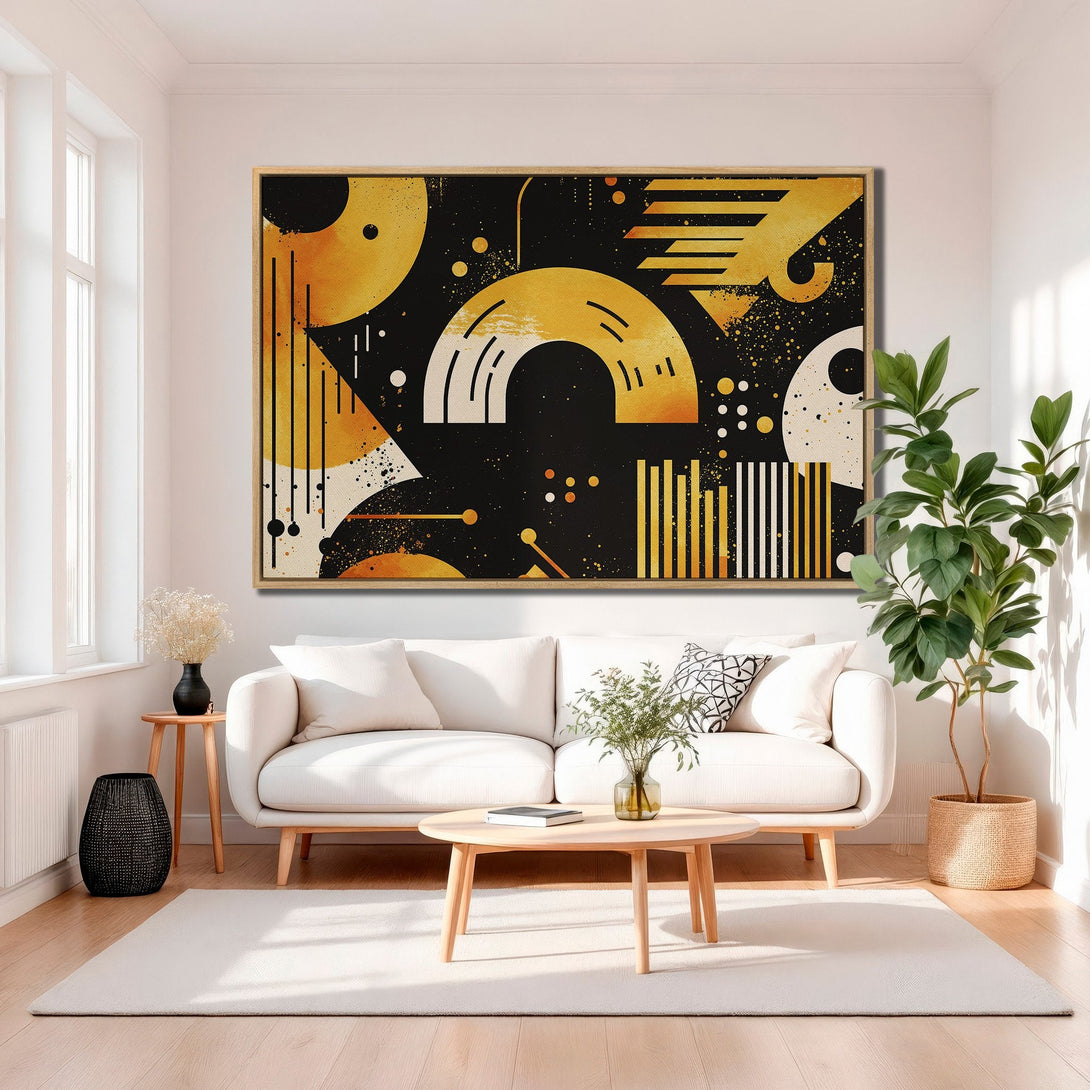 Framed Wall Art: Abstract geometric design in gold, black, and white. Modern art Canvas Print adds a stylish touch to a living room interior.