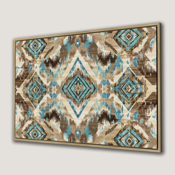 Framed Wall Art featuring a geometric ikat design in turquoise, brown, and beige. Perfect for adding a touch of boho style to your home.