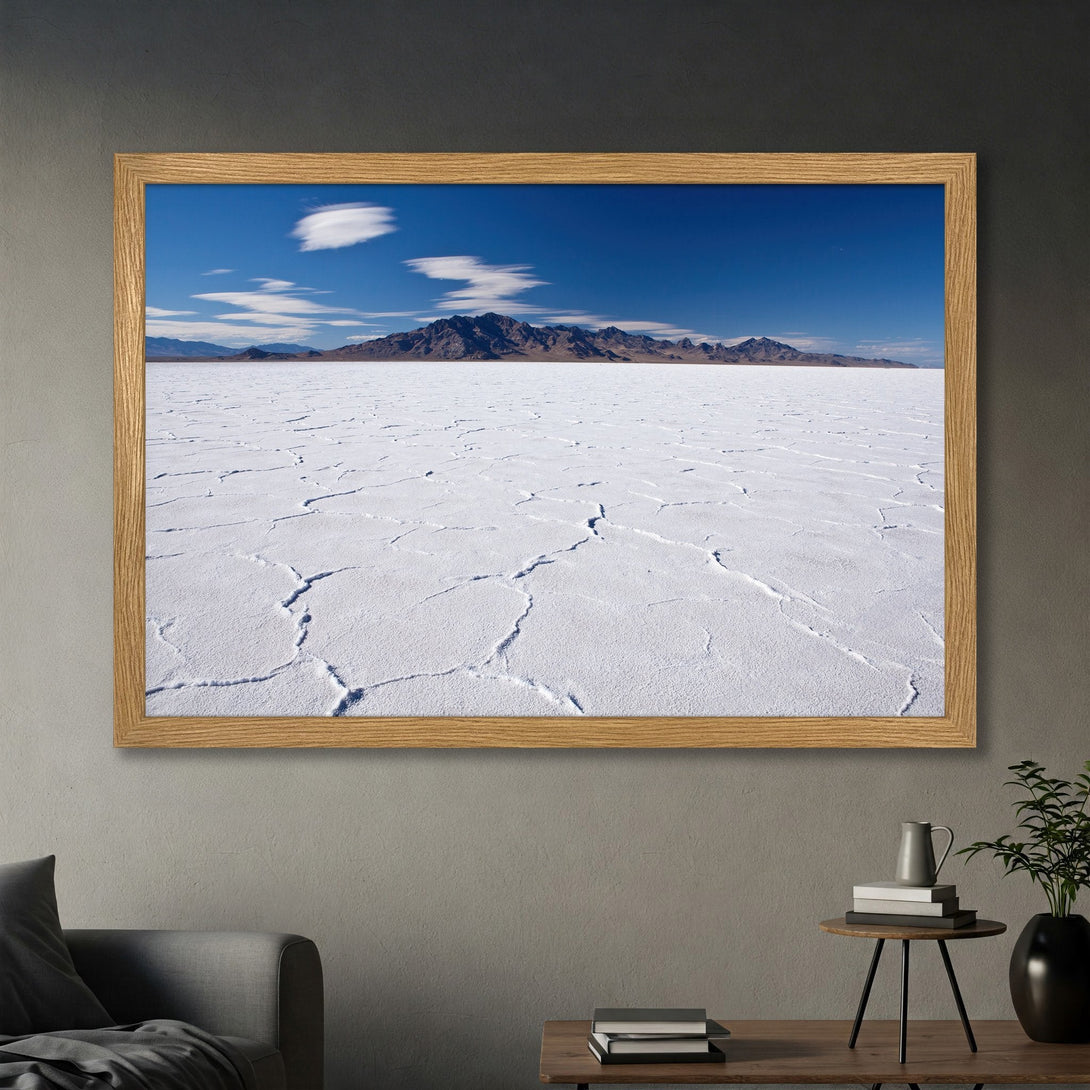 Framed Poster featuring a stunning landscape of a white salt flat under a blue sky with mountains. Nature-inspired art with a serene color palette.