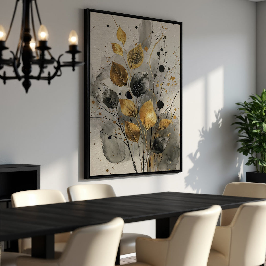 Framed Wall Art: Abstract botanical print with gold, black, and gray leaves. Modern art piece adds elegance to any dining room. Shop now!