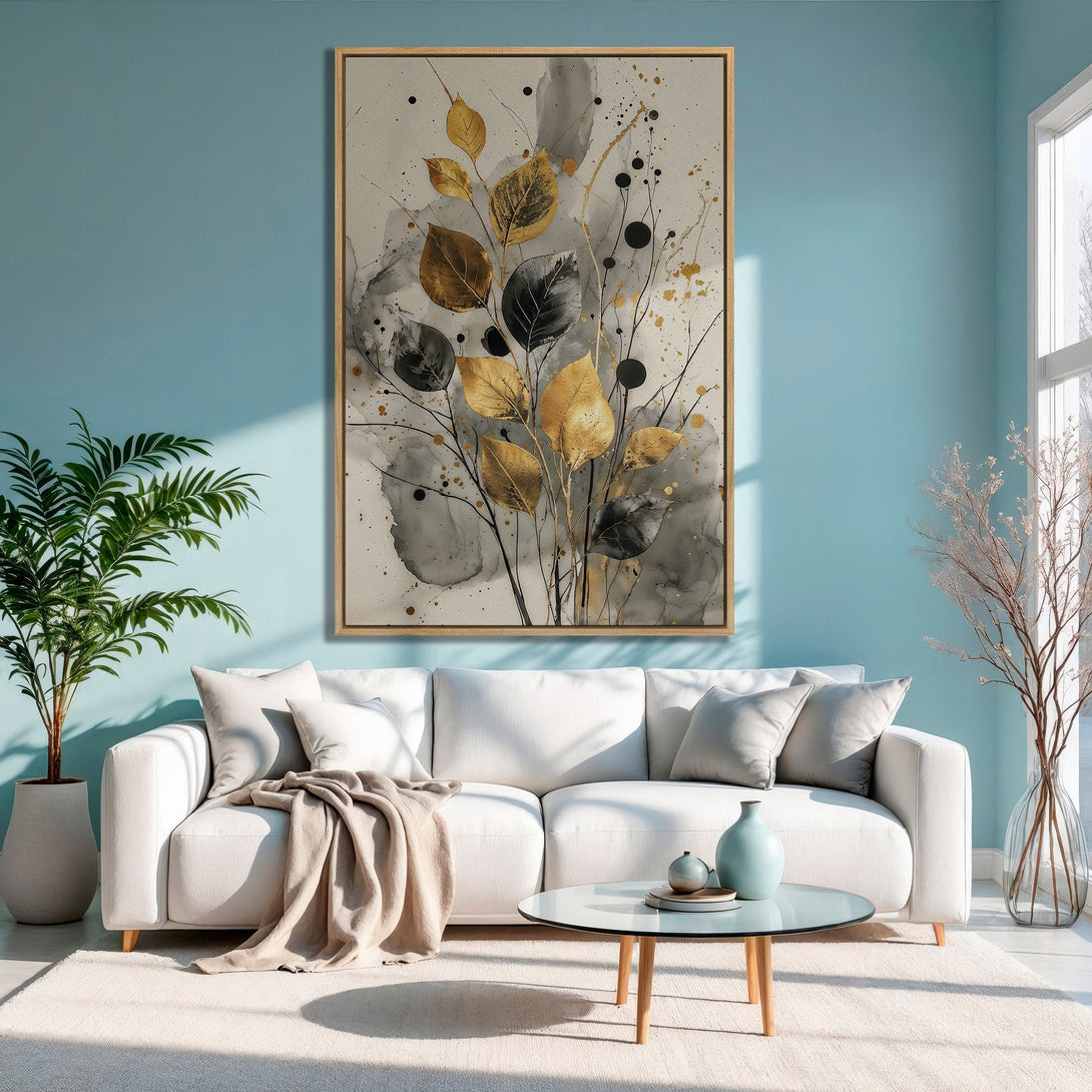 Framed Wall Art Canvas Print featuring gold and black leaves on a neutral background, adding a touch of modern elegance to any space.