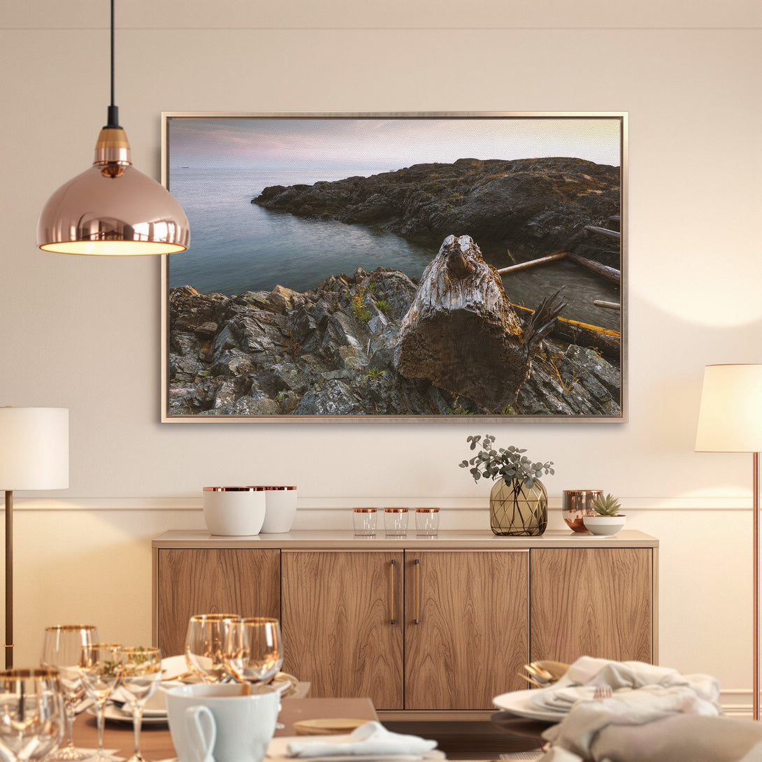 Framed Wall Art of a coastal scene with moody blues, grays, and beige. Perfect for adding a touch of nature to your home decor.