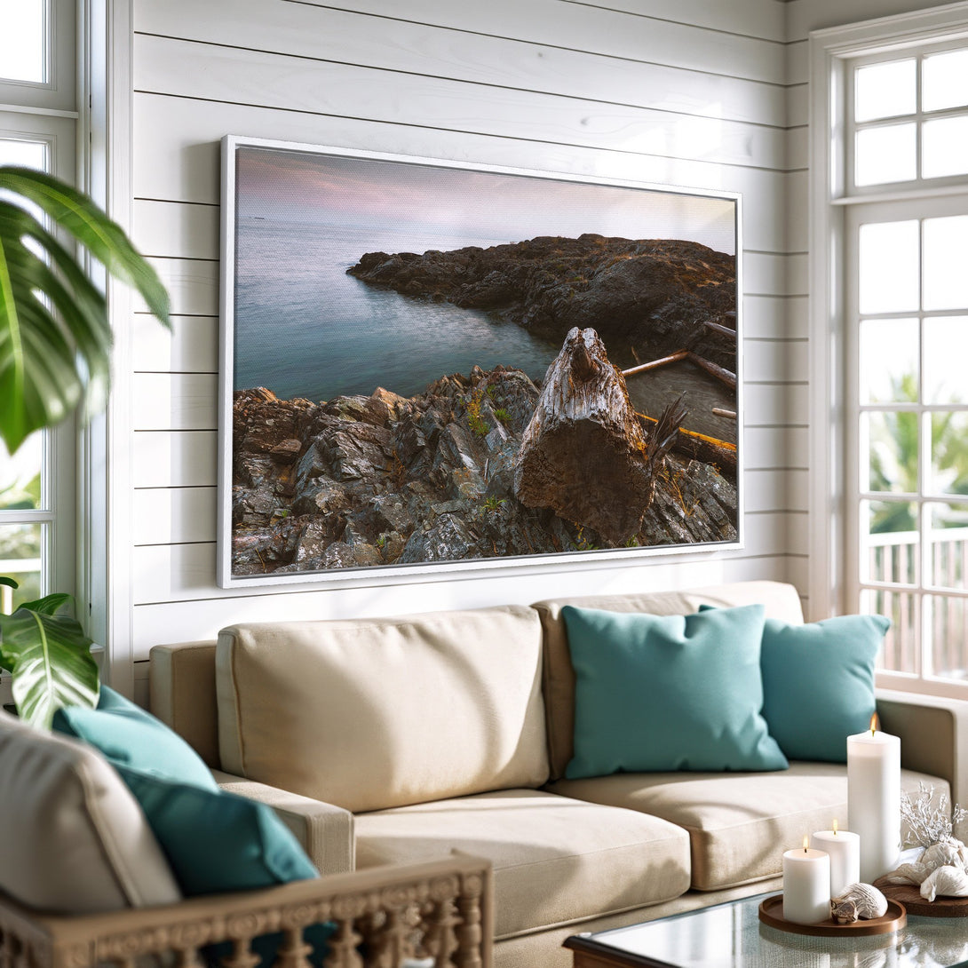 Framed Wall Art of coastal landscape in a living room. Featuring a serene ocean view with muted blues, grays, and beige tones. Perfect for adding a touch of nature.