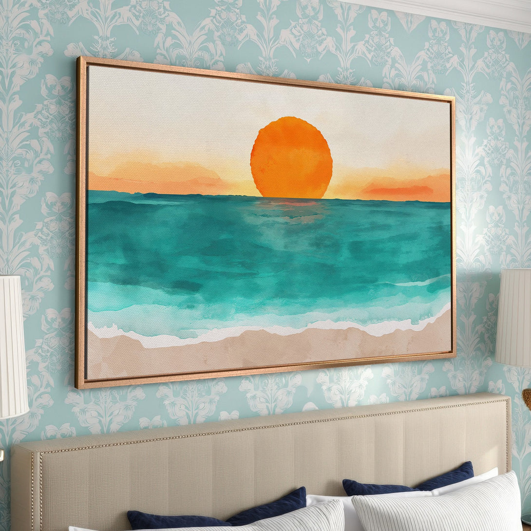 Framed Wall Art featuring a watercolor sunset over the ocean. Warm orange, teal, and beige tones create a calming coastal vibe. Perfect for bedroom decor.