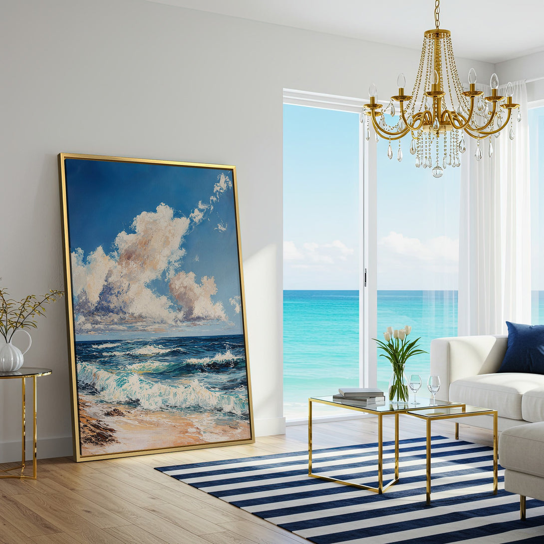Canvas Print of a seascape painting in a bright, airy living room. Features blue, white, and sand color palette, perfect for coastal decor.