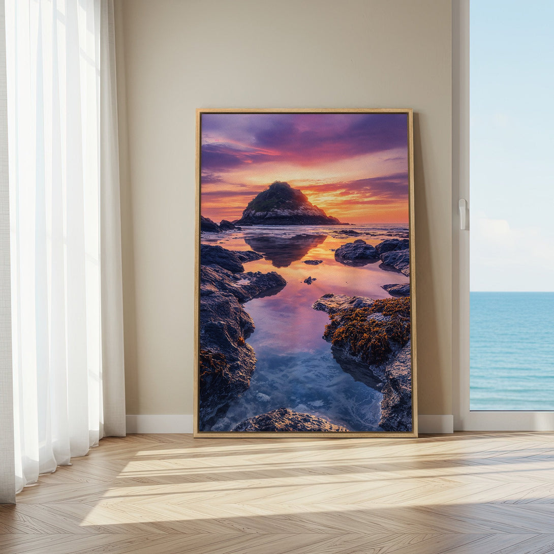 Framed Wall Art Canvas Print of a serene coastal sunset. Features vibrant orange, purple, and blue hues, perfect for adding a tranquil touch to any space.