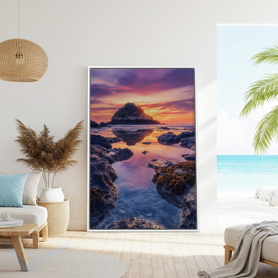 Framed Wall Art: Coastal sunset canvas print in vibrant purple and orange hues. Perfect beach decor for a calming, modern interior.