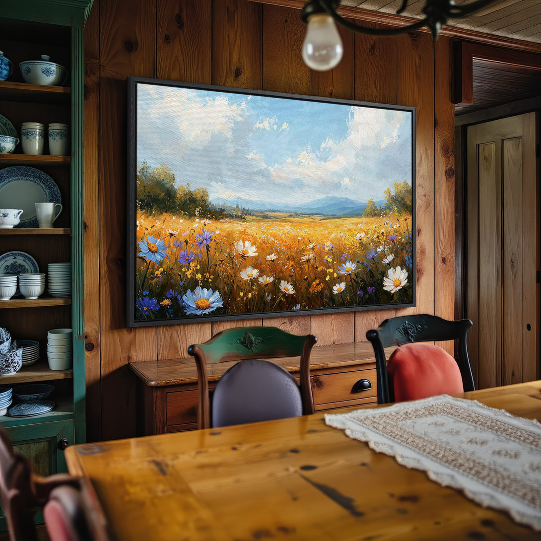 Framed Wall Art: Landscape Canvas Print with wildflowers in a field. Features a warm, inviting color palette of blues, yellows, and greens.