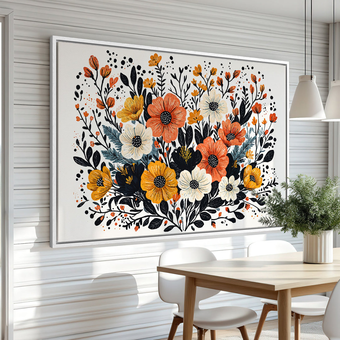 Framed Wall Art featuring a vibrant floral design in a modern style. Warm orange, yellow, and black hues create a cheerful and inviting aesthetic.
