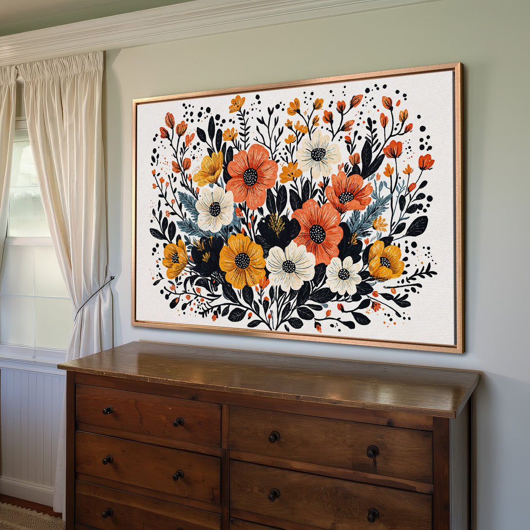 Framed Wall Art: Floral Canvas Print in warm orange, yellow, and black hues. Modern botanical art adds a pop of color to any room. Shop now!