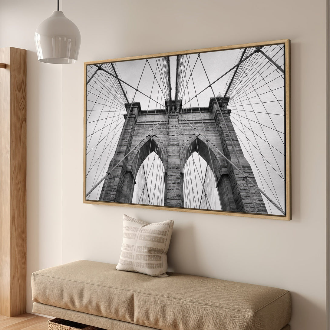 Framed Wall Art: Brooklyn Bridge Canvas Print in black and white. Modern decor for your home, featuring urban photography and neutral tones.