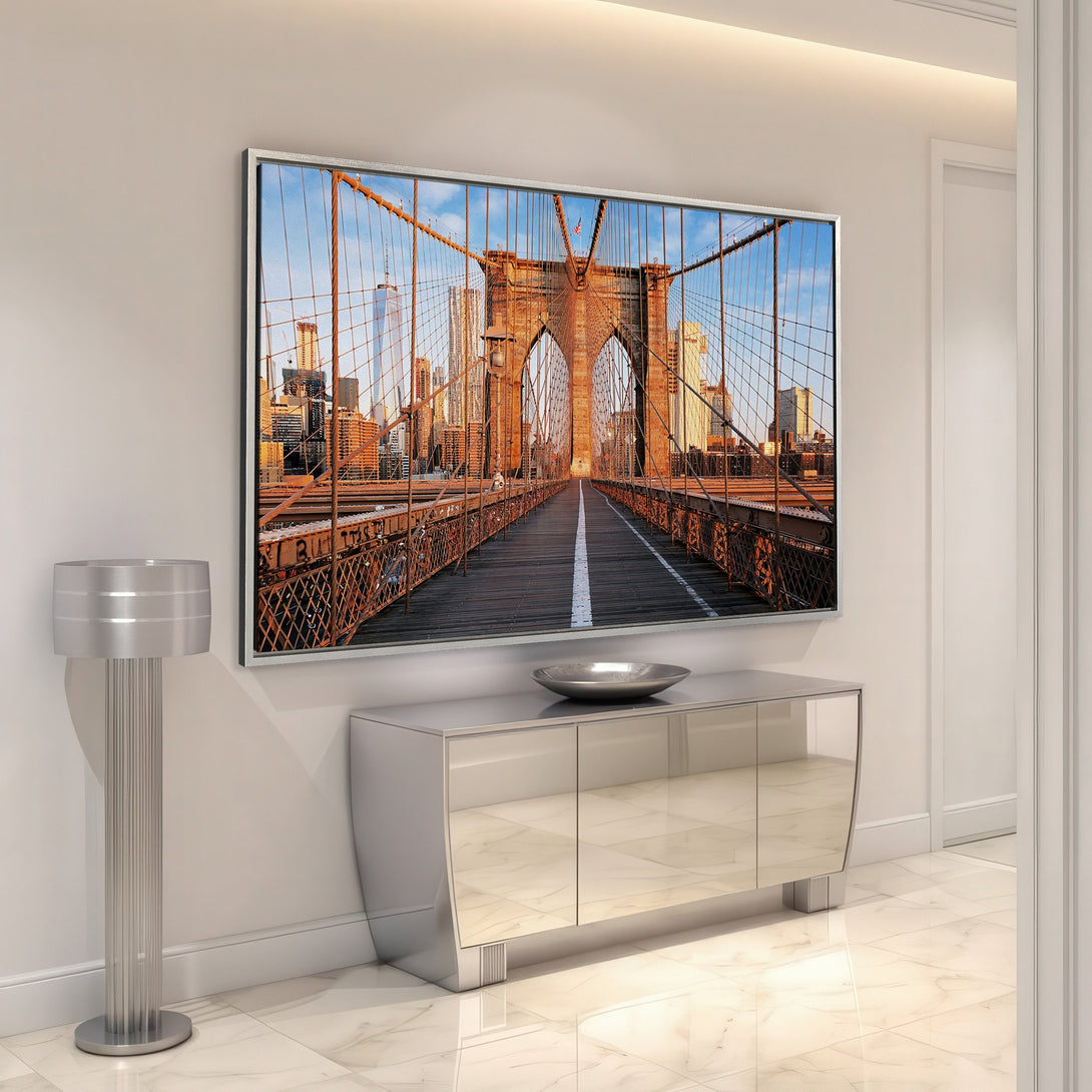 Framed Wall Art featuring the Brooklyn Bridge in warm tones. Modern decor with a cityscape canvas print, perfect for living room or bedroom.