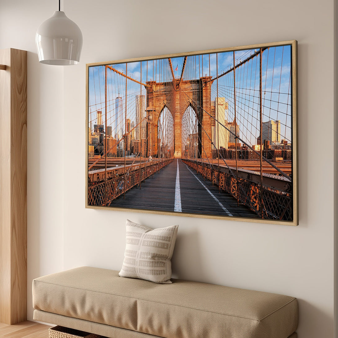 Framed Wall Art of Brooklyn Bridge. Capture the iconic NYC landmark with this stunning canvas print. Warm, inviting color palette perfect for any space.