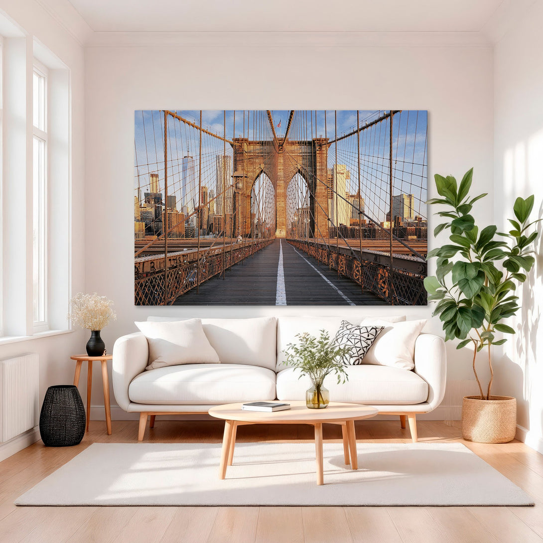Framed Wall Art: Brooklyn Bridge Canvas Print in warm tones. Modern cityscape art with a gold frame, perfect for living room decor.