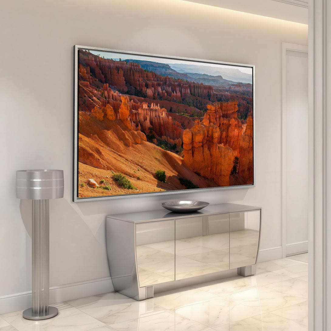Framed Wall Art featuring a stunning Bryce Canyon landscape. Warm orange and red hues create a breathtaking focal point for any modern interior.