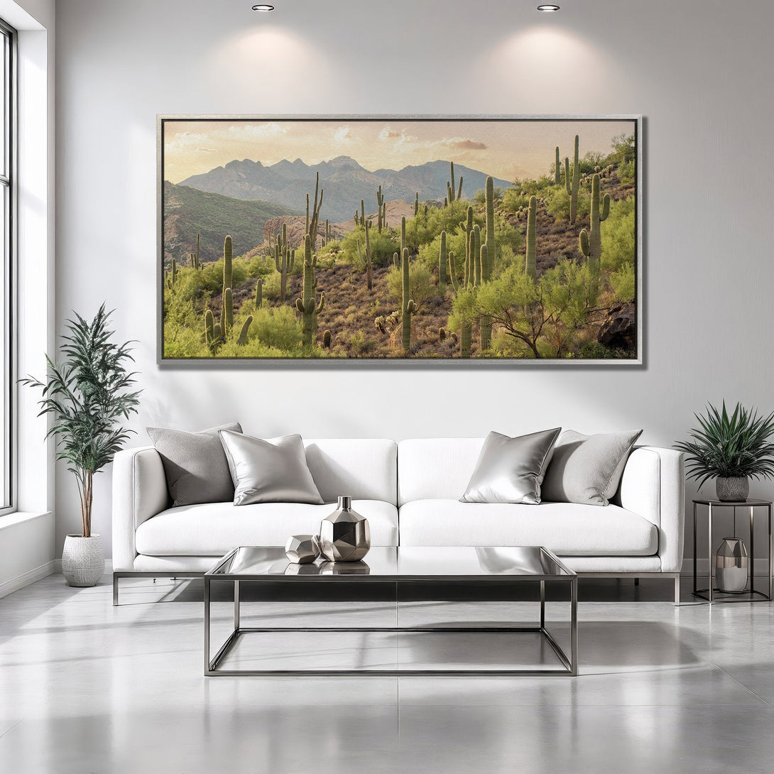 Framed Wall Art: Desert landscape canvas print with cacti and mountains in a warm, natural color palette, perfect for modern home decor.
